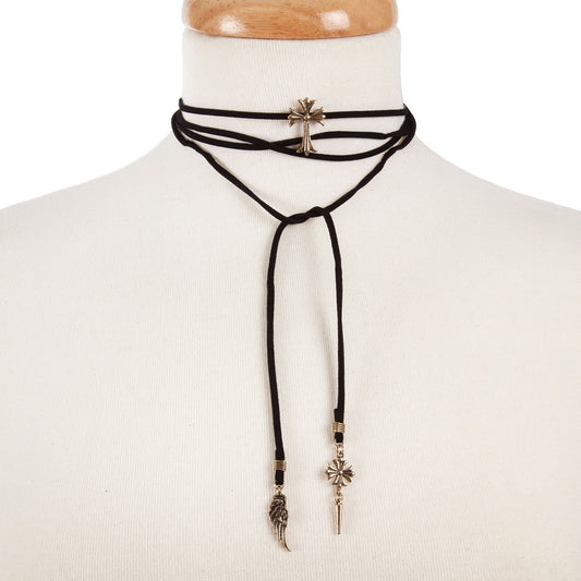 Black faux suede wrap choker necklace with a gold tone cross focal