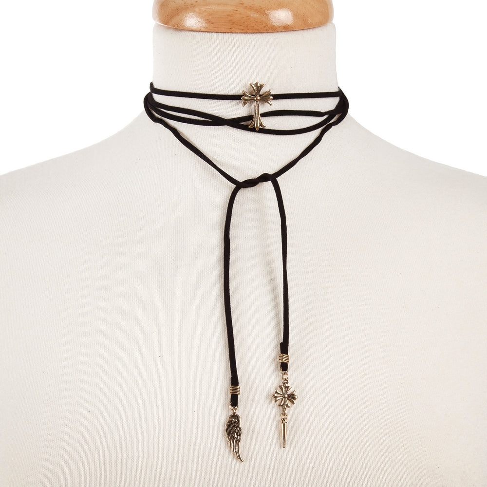 Black faux suede wrap choker necklace with a gold tone cross focal