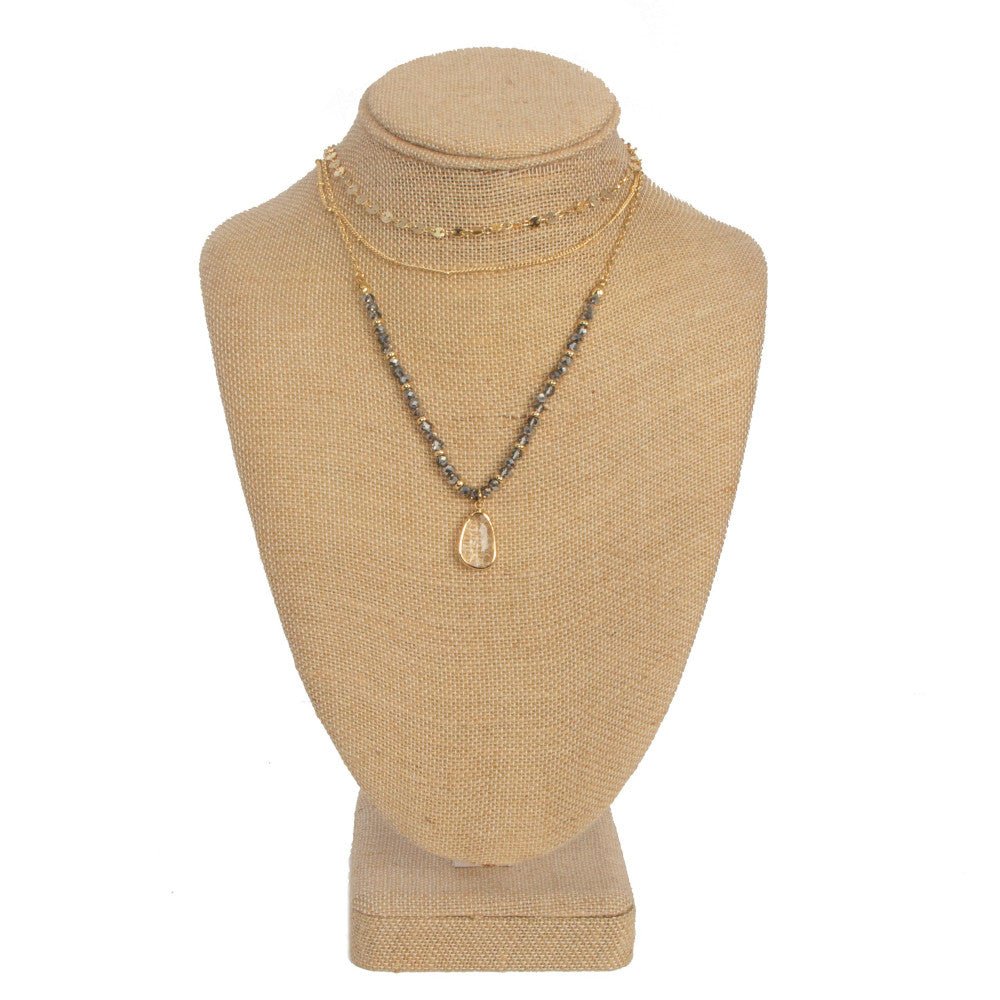 Layered necklace with faceted bead detail. Approximately 14-20" in length