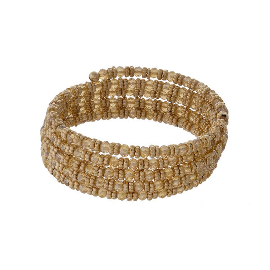 Gold tone and topaz beaded coil bracelet