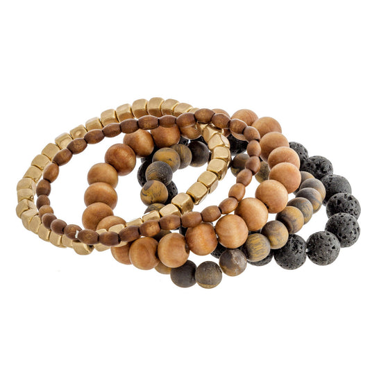 Bracelet set featuring five stretch bracelets with wood, natural stone and lava rock inspired beads and gold accents