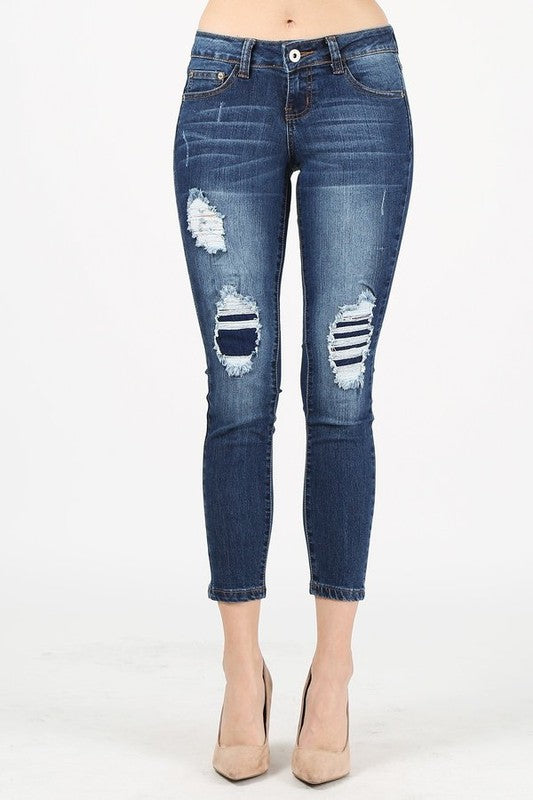 CAPRI LENGTH DESTROYED DENIM PANTS