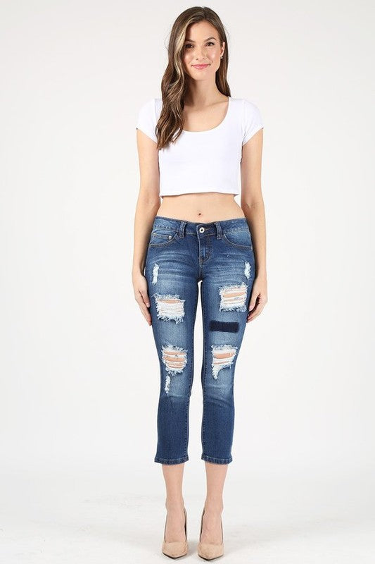 CAPRI LENGTH DESTROYED DENIM PANTS