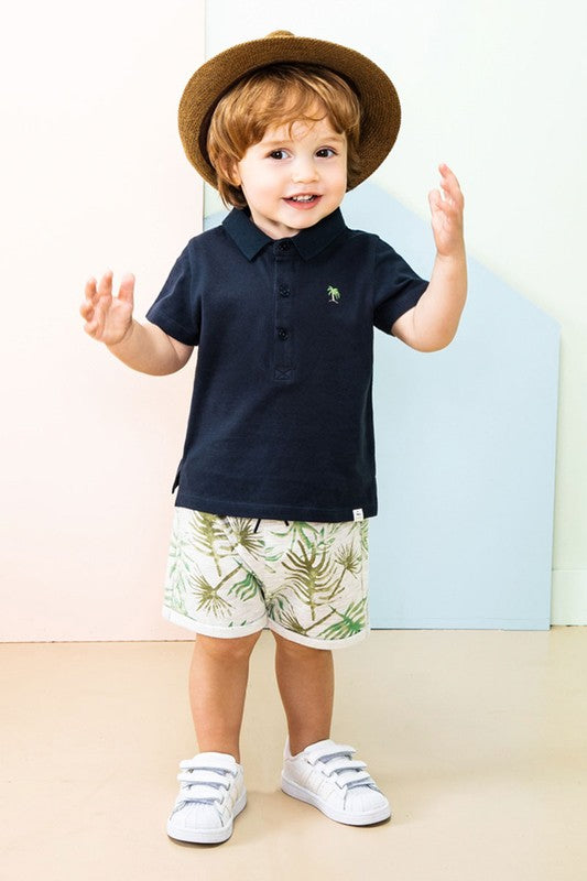 Short sleeve collared polo shirt with palm tree embroidery