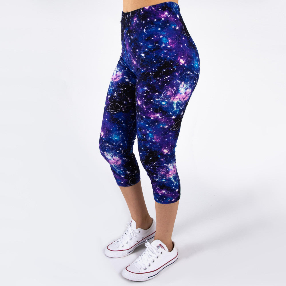 ONE SIZE Peach skin galaxy print capri style leggings featuring stars, planets, and moons