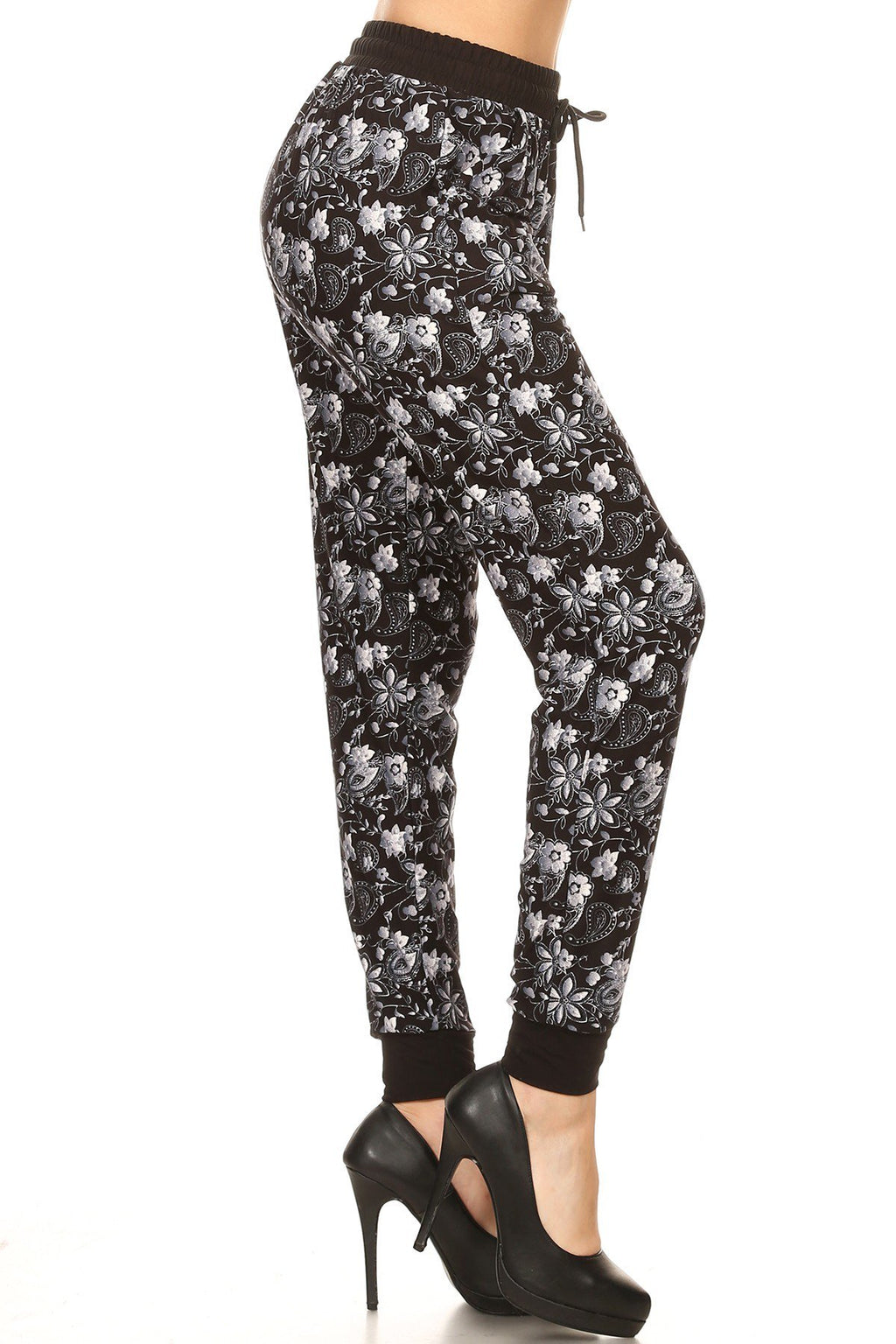 MIXED FLORAL PAISLEY joggers with solid trim, drawstring waistband, waist pockets, and cuffed hems