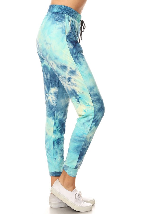 LT BLUE TIE DYE joggers with solid trim, drawstring waistband, waist pockets, and cuffed hems