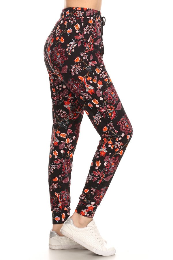 FLORAL joggers with solid trim, drawstring waistband, waist pockets, and cuffed hems