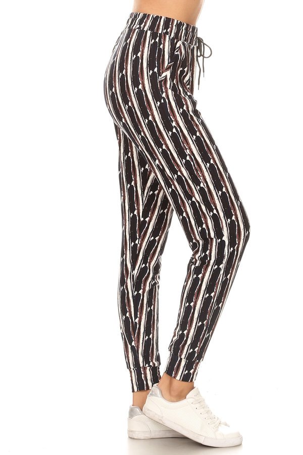 STRIPE joggers with solid trim, drawstring waistband, waist pockets, and cuffed hems