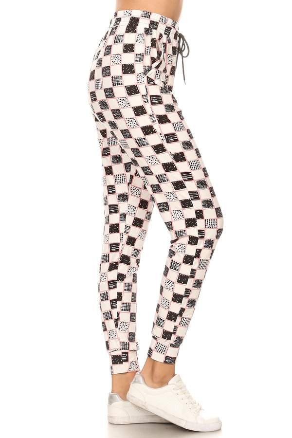 CHECKERED joggers with solid trim, drawstring waistband, waist pockets, and cuffed hems