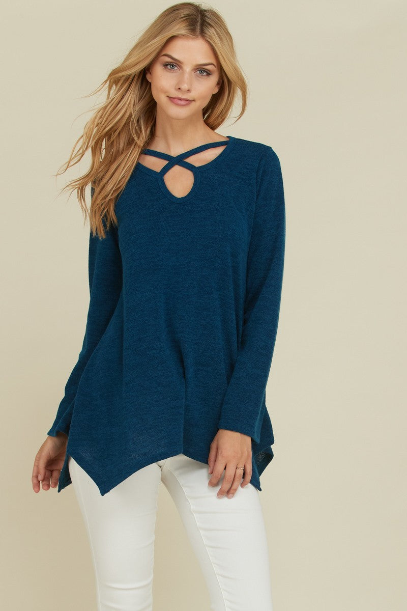 Long sleeve sharkbite silhouette sweater with keyhole and strap detail at neckline